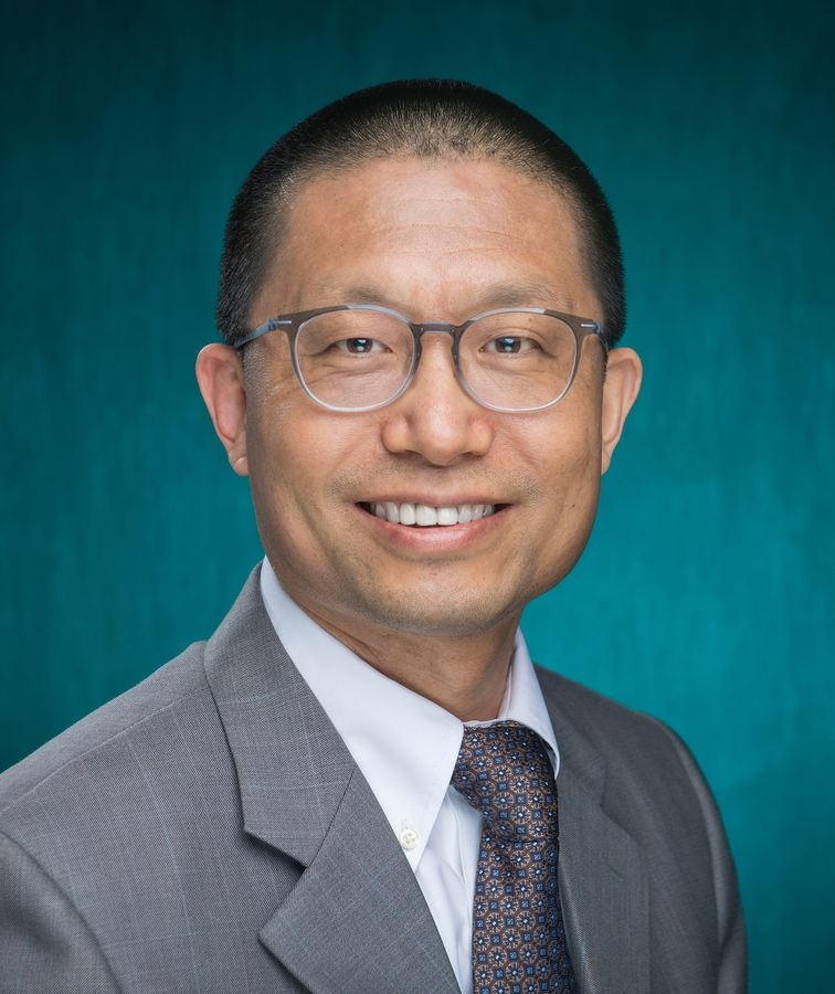 Yishi Wang