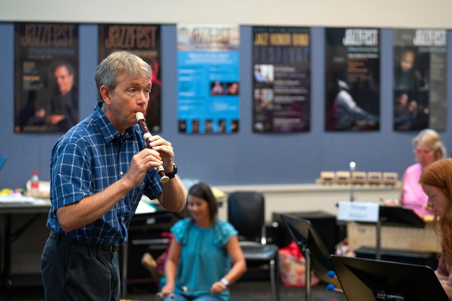 Dan Johnson plays recorder during a course on Orff-Schulwerk pedagogical methods